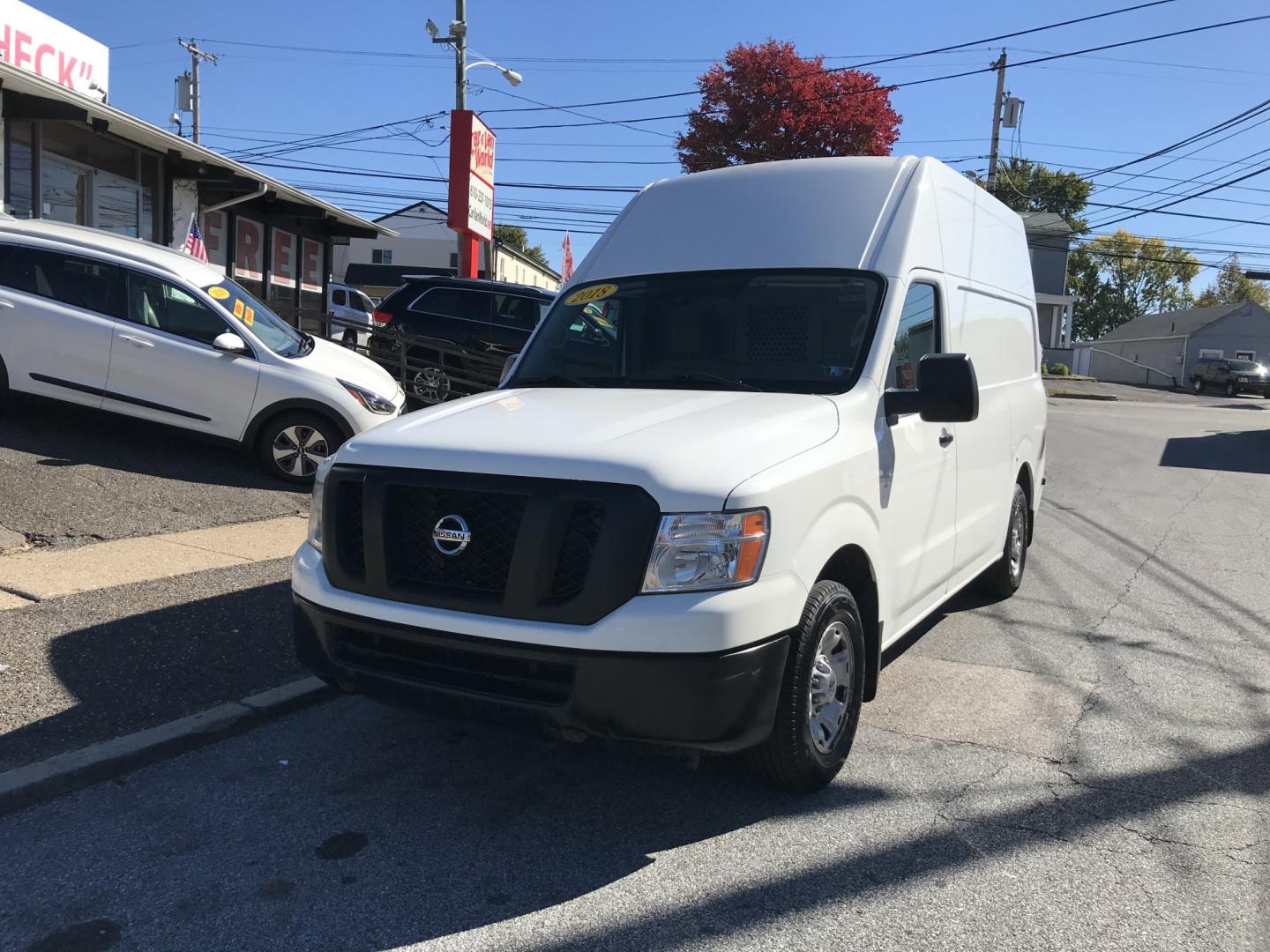 2018 White /Gray Nissan NV Cargo 2500 HD S V6 High Roof (1N6BF0LY1JN) with an 4.0L V6 engine, 5A transmission, located at 577 Chester Pike, Prospect Park, PA, 19076, (610) 237-1015, 39.886154, -75.302338- Photo#2