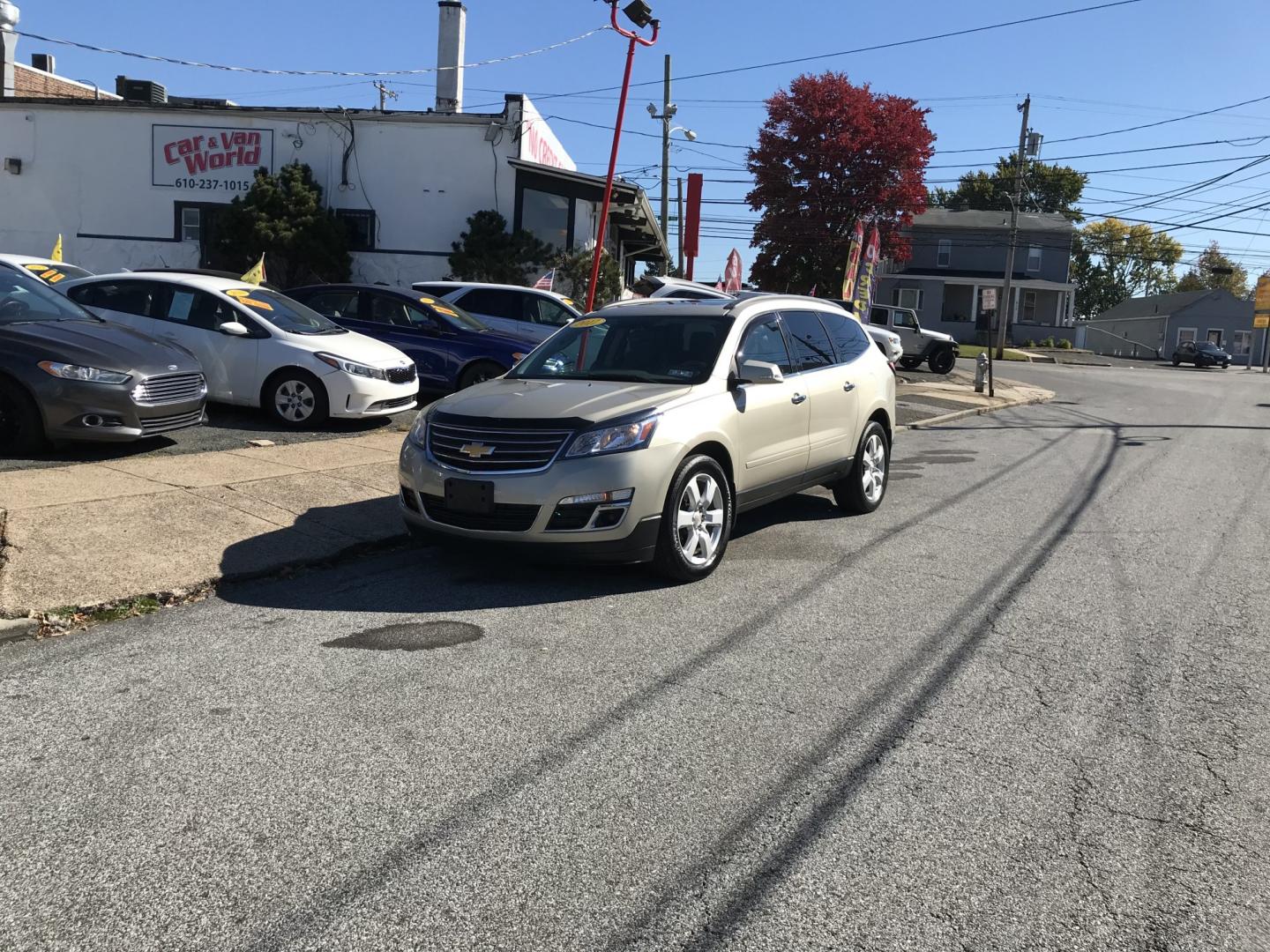 2017 Gold /Beige Chevrolet Traverse 1LT AWD (1GNKVGKD9HJ) with an 3.6L V6 DOHC 24V engine, 6A transmission, located at 577 Chester Pike, Prospect Park, PA, 19076, (610) 237-1015, 39.886154, -75.302338 - 2017 Chevrolet Traverse LT: Double sunroofs, backup camera, DVD player, AWD, 3rd row seating, new PA inspection, SUPER CLEAN, runs LIKE NEW! This vehicle comes inspected and has been given a bumper to bumper safety check. It is very clean, reliable, and well maintained. We offer a unique pay plan- Photo#1