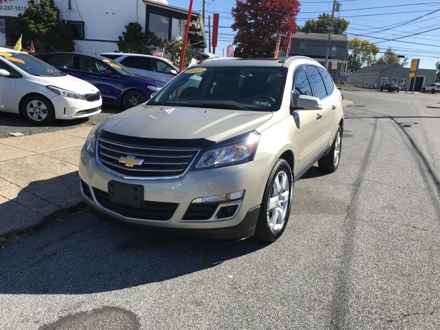 2017 Gold /Beige Chevrolet Traverse 1LT AWD (1GNKVGKD9HJ) with an 3.6L V6 DOHC 24V engine, 6A transmission, located at 577 Chester Pike, Prospect Park, PA, 19076, (610) 237-1015, 39.886154, -75.302338 - 2017 Chevrolet Traverse LT: Double sunroofs, backup camera, DVD player, AWD, 3rd row seating, new PA inspection, SUPER CLEAN, runs LIKE NEW! This vehicle comes inspected and has been given a bumper to bumper safety check. It is very clean, reliable, and well maintained. We offer a unique pay plan- Photo#2