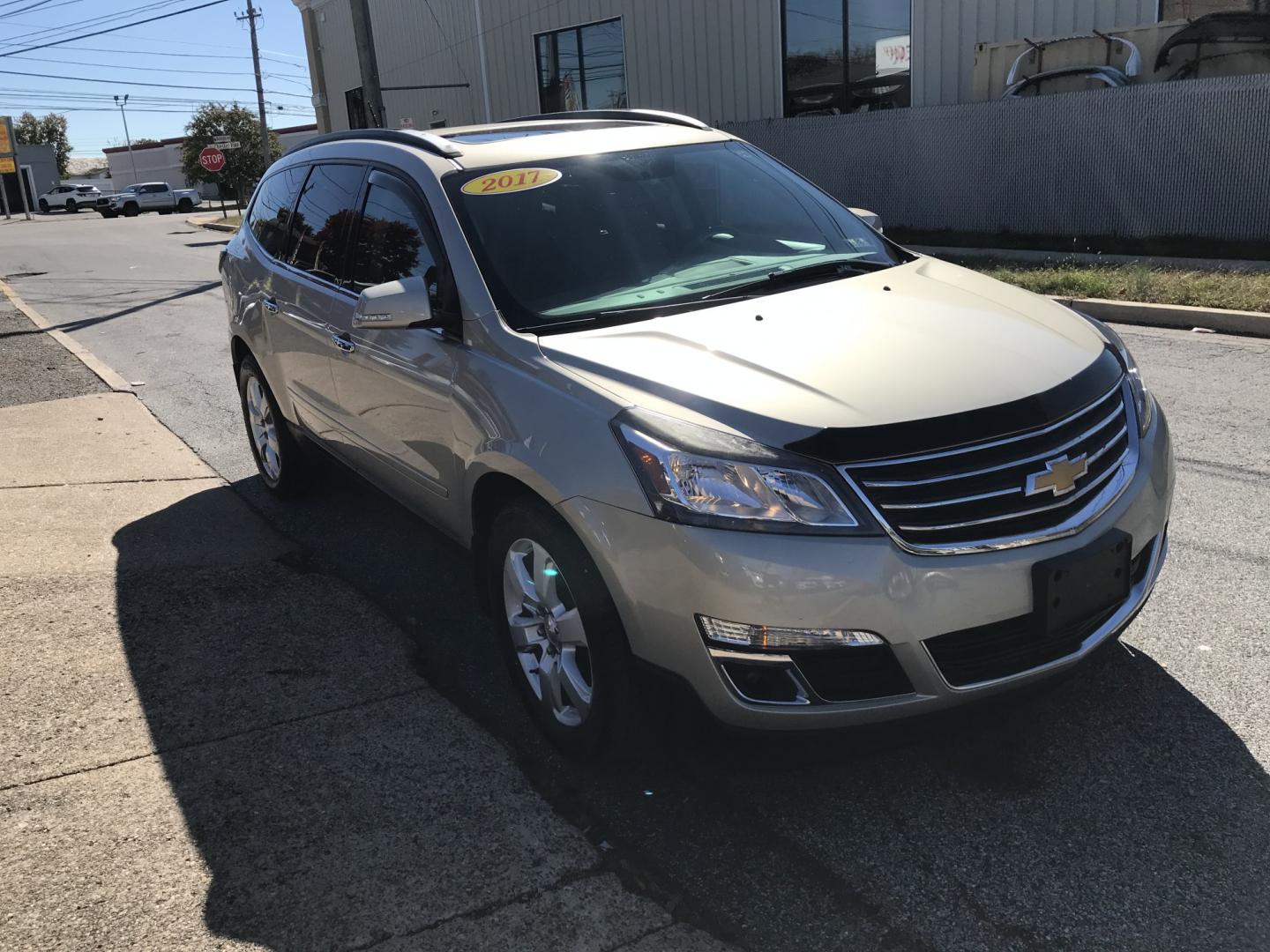 2017 Gold /Beige Chevrolet Traverse 1LT AWD (1GNKVGKD9HJ) with an 3.6L V6 DOHC 24V engine, 6A transmission, located at 577 Chester Pike, Prospect Park, PA, 19076, (610) 237-1015, 39.886154, -75.302338 - 2017 Chevrolet Traverse LT: Double sunroofs, backup camera, DVD player, AWD, 3rd row seating, new PA inspection, SUPER CLEAN, runs LIKE NEW! This vehicle comes inspected and has been given a bumper to bumper safety check. It is very clean, reliable, and well maintained. We offer a unique pay plan- Photo#3