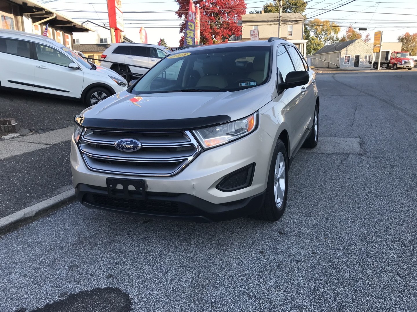 2018 Gold /Beige Ford Edge SE AWD (2FMPK4G96JB) with an 2.0L L4 DOHC 16V engine, 6A transmission, located at 577 Chester Pike, Prospect Park, PA, 19076, (610) 237-1015, 39.886154, -75.302338 - 2018 Ford Edge SE: Only 93k miles, AWD, backup camera, new PA inspection, SUPER CLEAN, runs LIKE NEW! This vehicle comes inspected and has been given a bumper to bumper safety check. It is very clean, reliable, and well maintained. We offer a unique pay plan that is known for being the easiest an- Photo#2