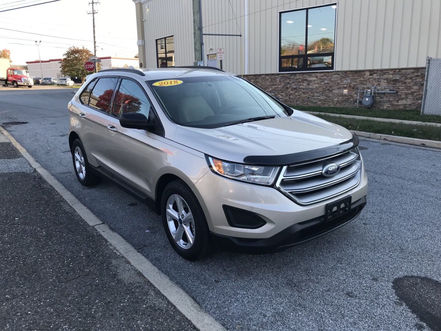 2018 Gold /Beige Ford Edge SE AWD (2FMPK4G96JB) with an 2.0L L4 DOHC 16V engine, 6A transmission, located at 577 Chester Pike, Prospect Park, PA, 19076, (610) 237-1015, 39.886154, -75.302338 - 2018 Ford Edge SE: Only 93k miles, AWD, backup camera, new PA inspection, SUPER CLEAN, runs LIKE NEW! This vehicle comes inspected and has been given a bumper to bumper safety check. It is very clean, reliable, and well maintained. We offer a unique pay plan that is known for being the easiest an- Photo#3